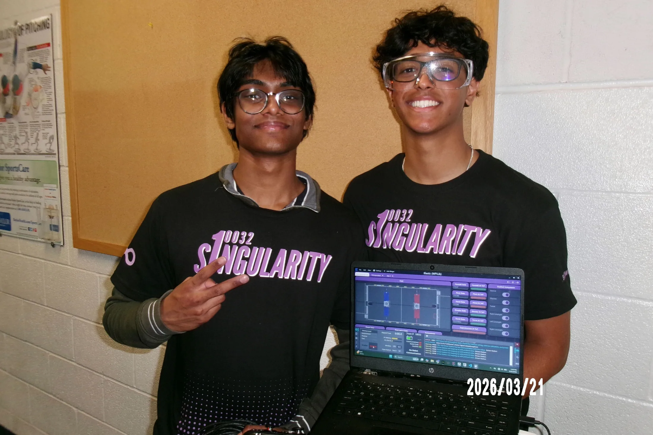 Two members in the pit