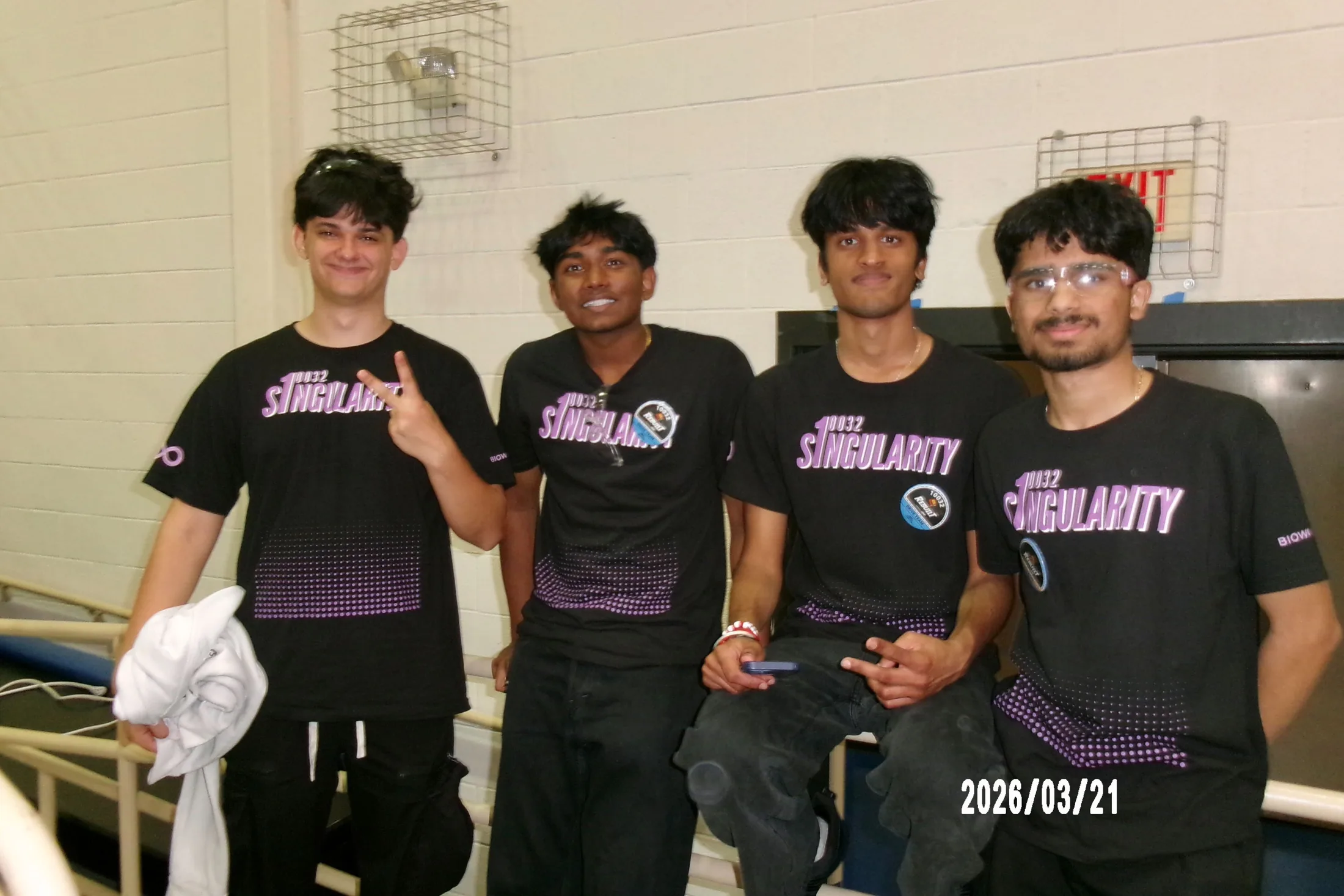 Members in the hallway between matches