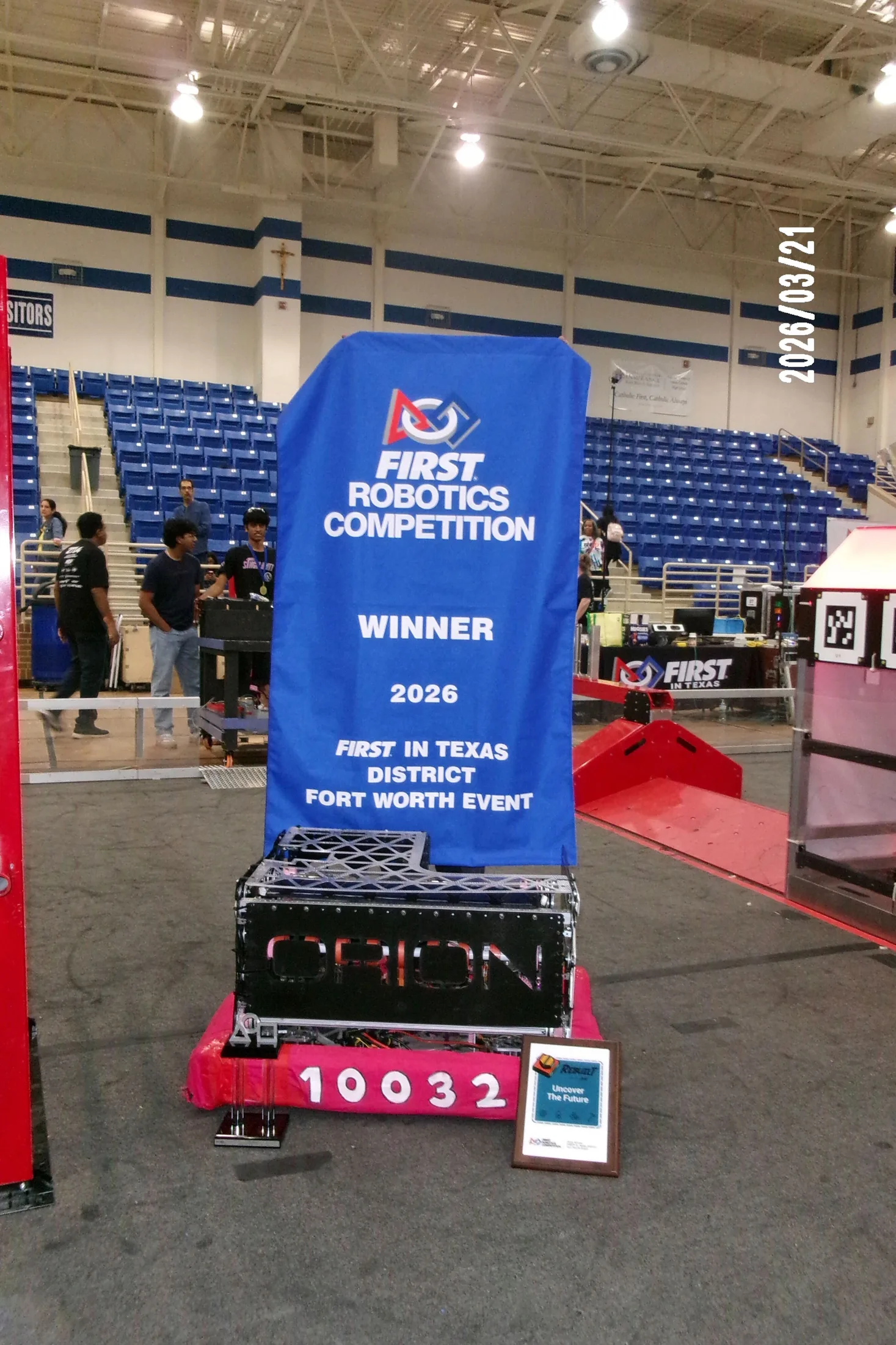 The Fort Worth district winner banner beside ORION