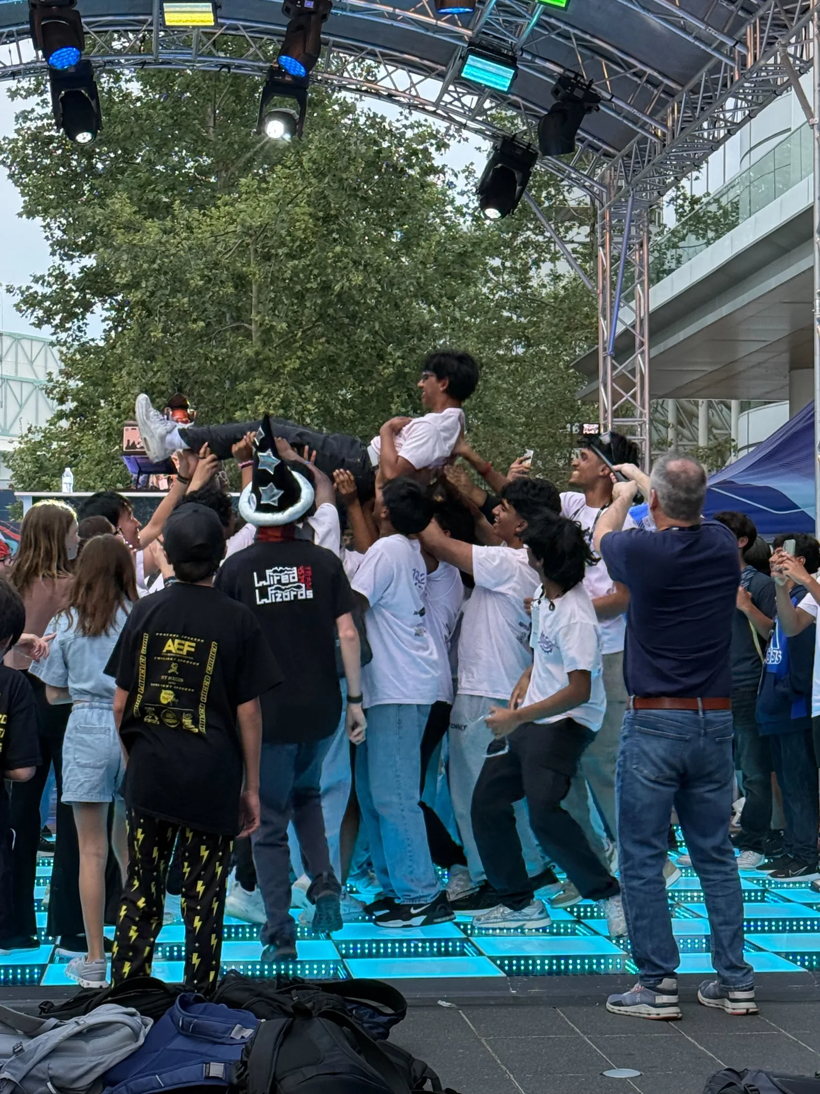 The team celebrating outside the arena