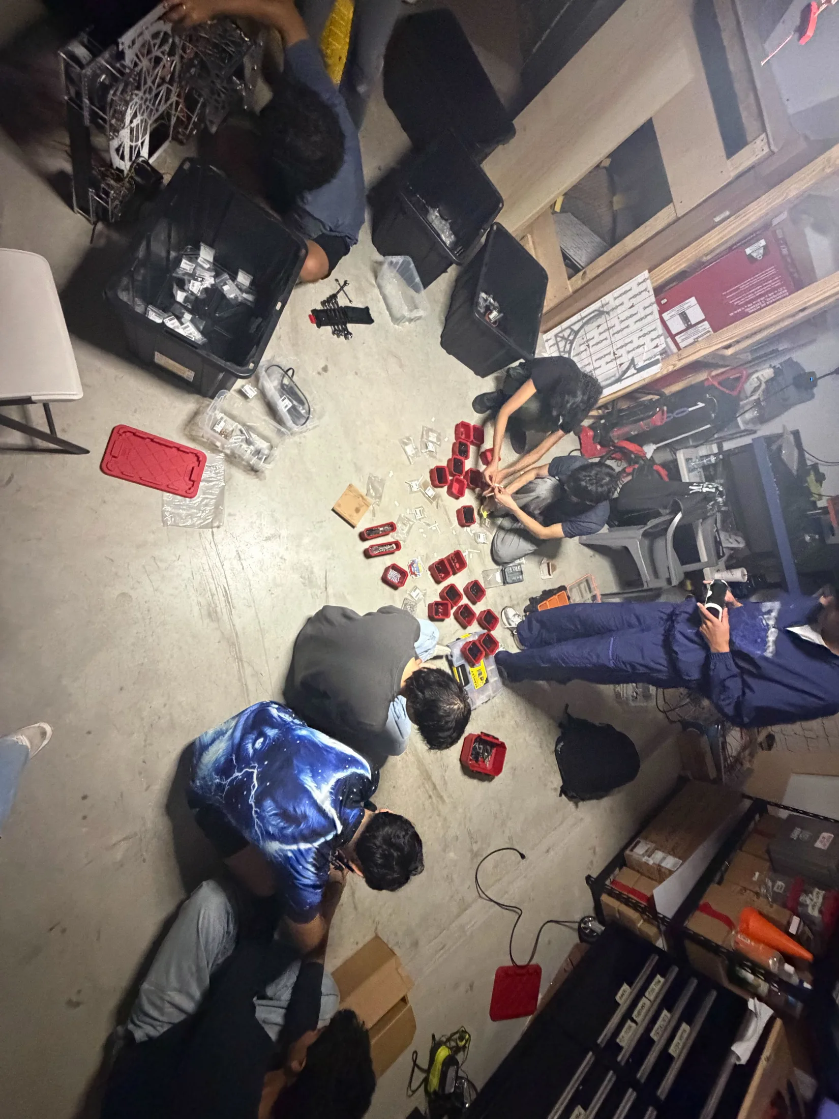 Parts laid out on the garage floor