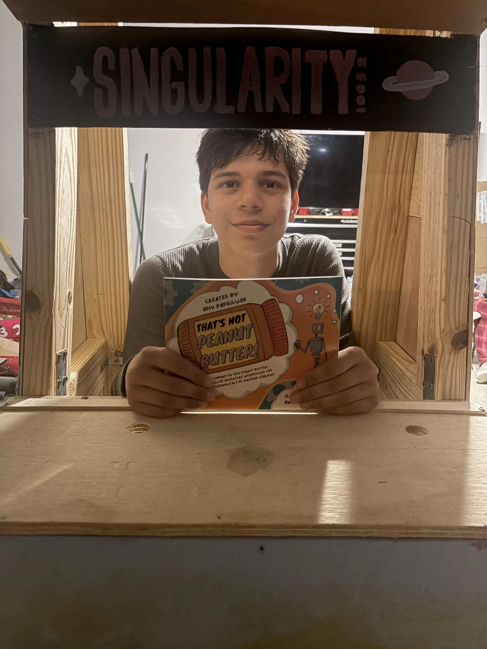 Holding That's Not Peanut Butter! at the Singularity booth