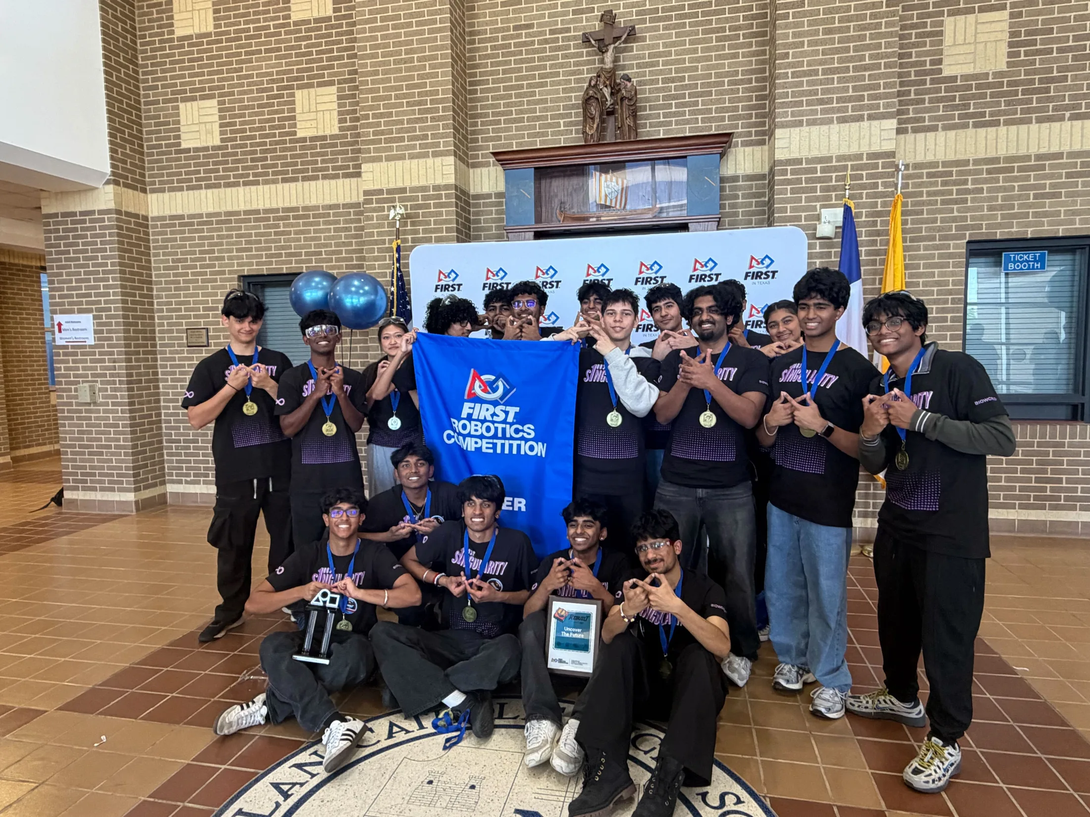 The team with the Fort Worth winner banner at school
