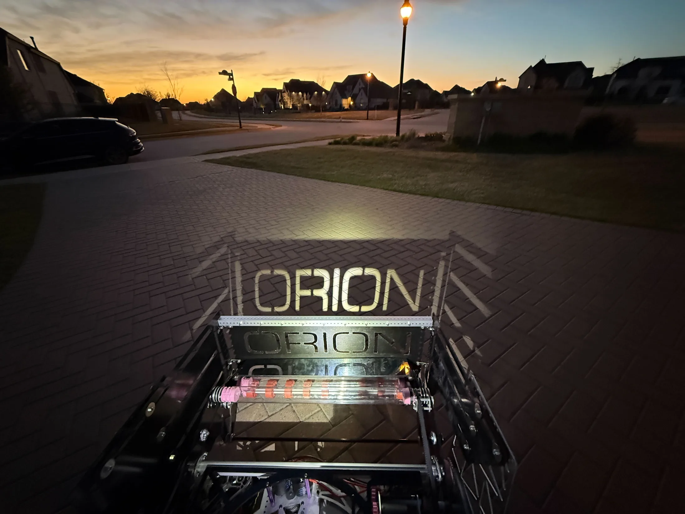 ORION on the driveway at dusk after a build night
