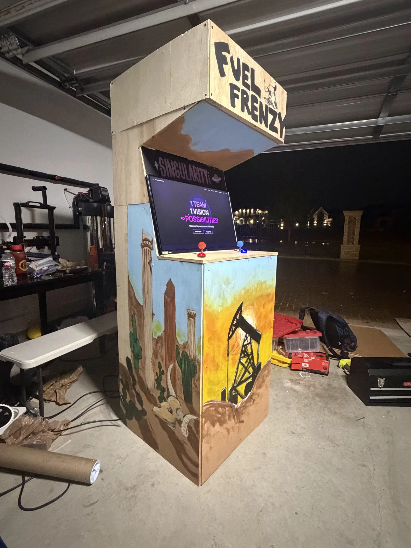 The Fuel Frenzy cabinet at night